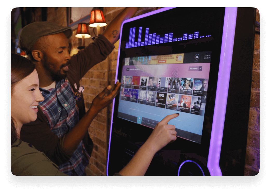 people playing music on the virtuo jukebox