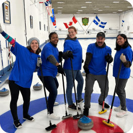 employees having fun curling